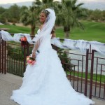 Bride posing on balcony