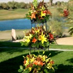 3-tier pyramid of flowers on golf course