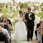 Bride and groom walking up aisle after ceremony