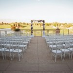 Wedding ceremony seating on terrace overlooking the golf course 