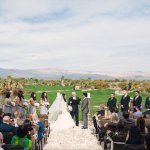 Wedding ceremony with golf course and mountain in the background 