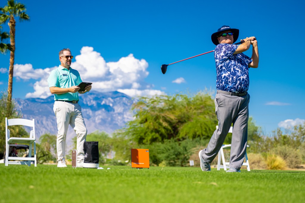 PGA golf instructor using TrackMan4 and OnForm video analysis to enhance a golfer’s swing at Desert Willow Golf Resort.
