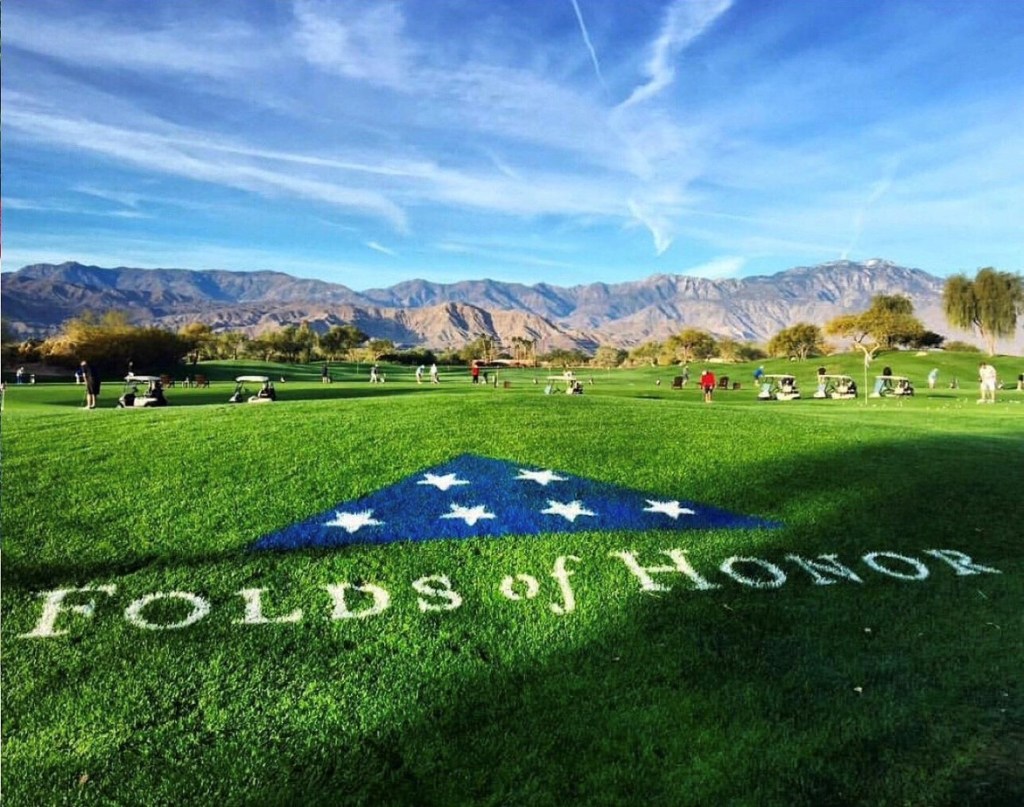 Folds of Honor logo painted on the practice facility at Desert Willow Golf Resort for fundraising event.